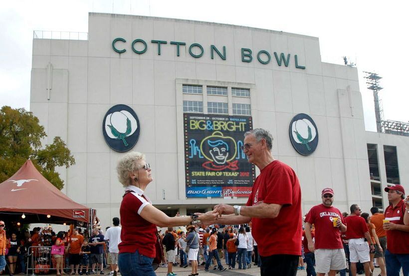 OU fans Sherry Steele and her husband Chuck Messer of Austin, dance prior to the Texas-OU...