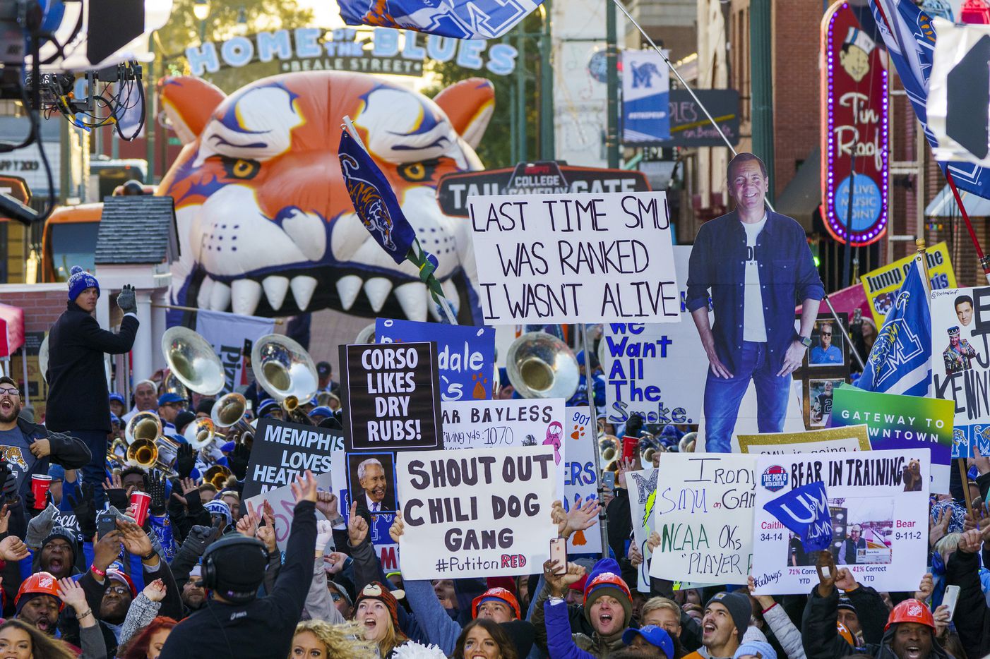 Fans fill Beale Street for ESPN College GameDay before an NCAA football game between Memphis...