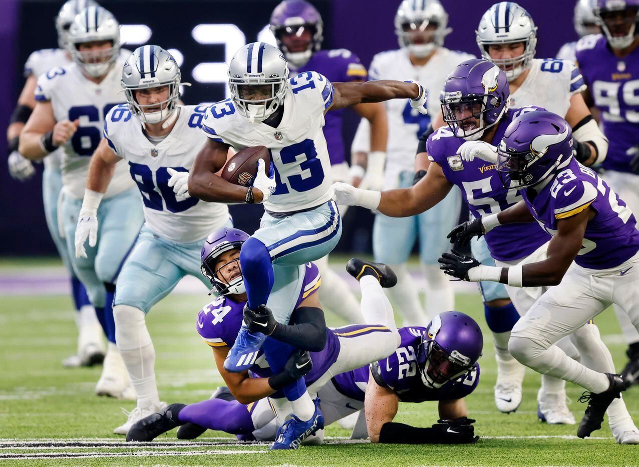 Dallas Cowboys wide receiver Michael Gallup (13) breaks free of Minnesota Vikings safety...