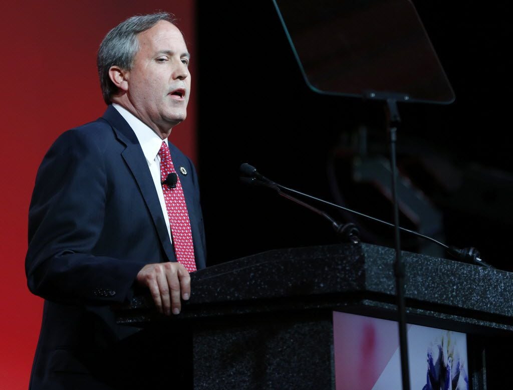 Texas Attorney General Ken Paxton speaks to the crowd during the 2016 Texas Republican...