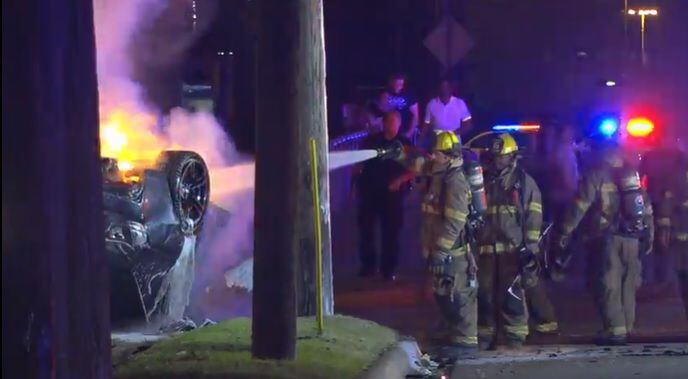 Dallas Fire-Rescue officials work a crash in the 1600 block of Good Latimer Expressway.