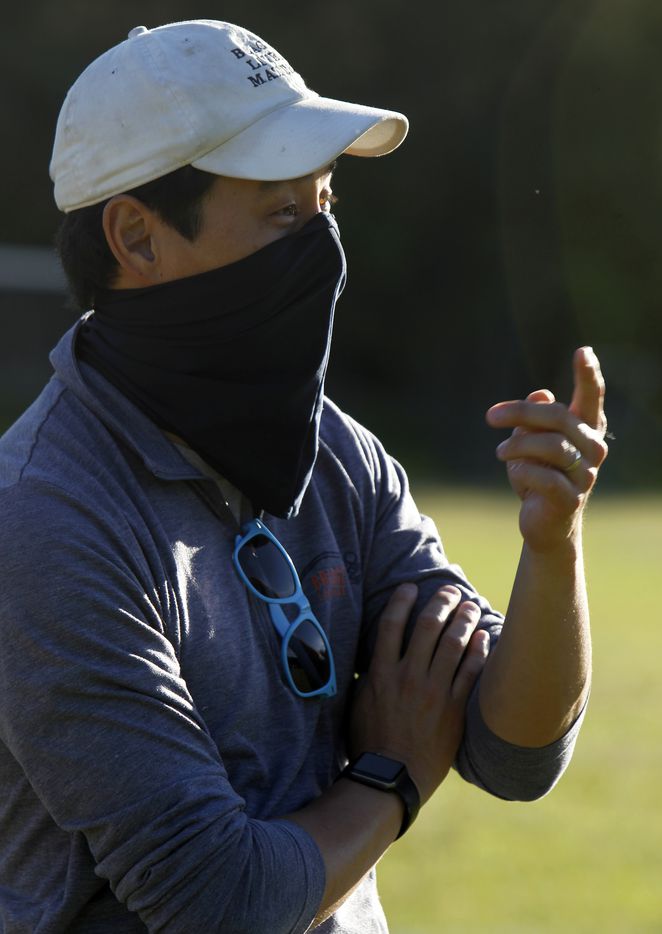 David Higbee, head coach of the Bridge Eagles lacrosse team, closely monitors practice progress. The Bridge lacrosse team held their Wednesday evening practice session at the JC Phelps Recreation Center in Dallas on May 5, 2021.