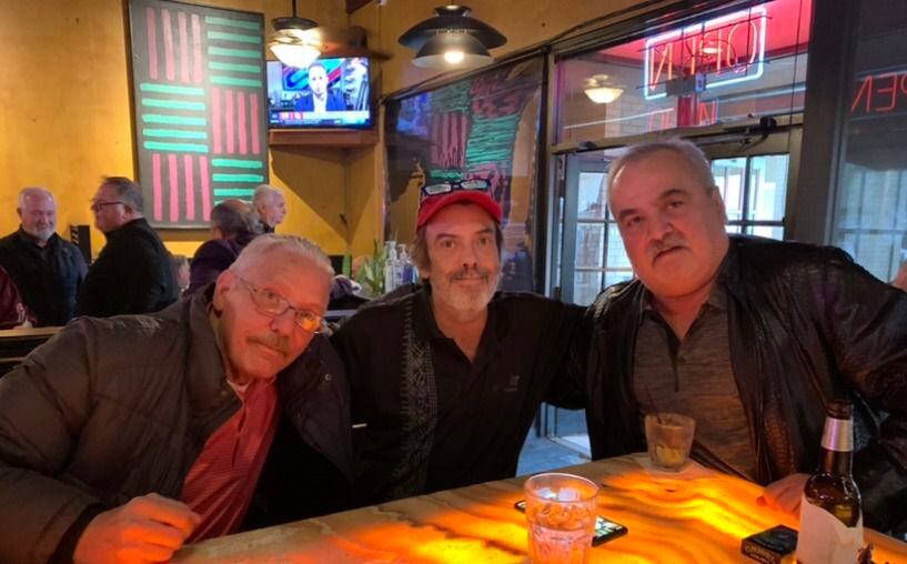 Regulars Richard Staggs, Clark Anderson and Walter Otstott share a last round before Cafe Gecko closed in 2021.