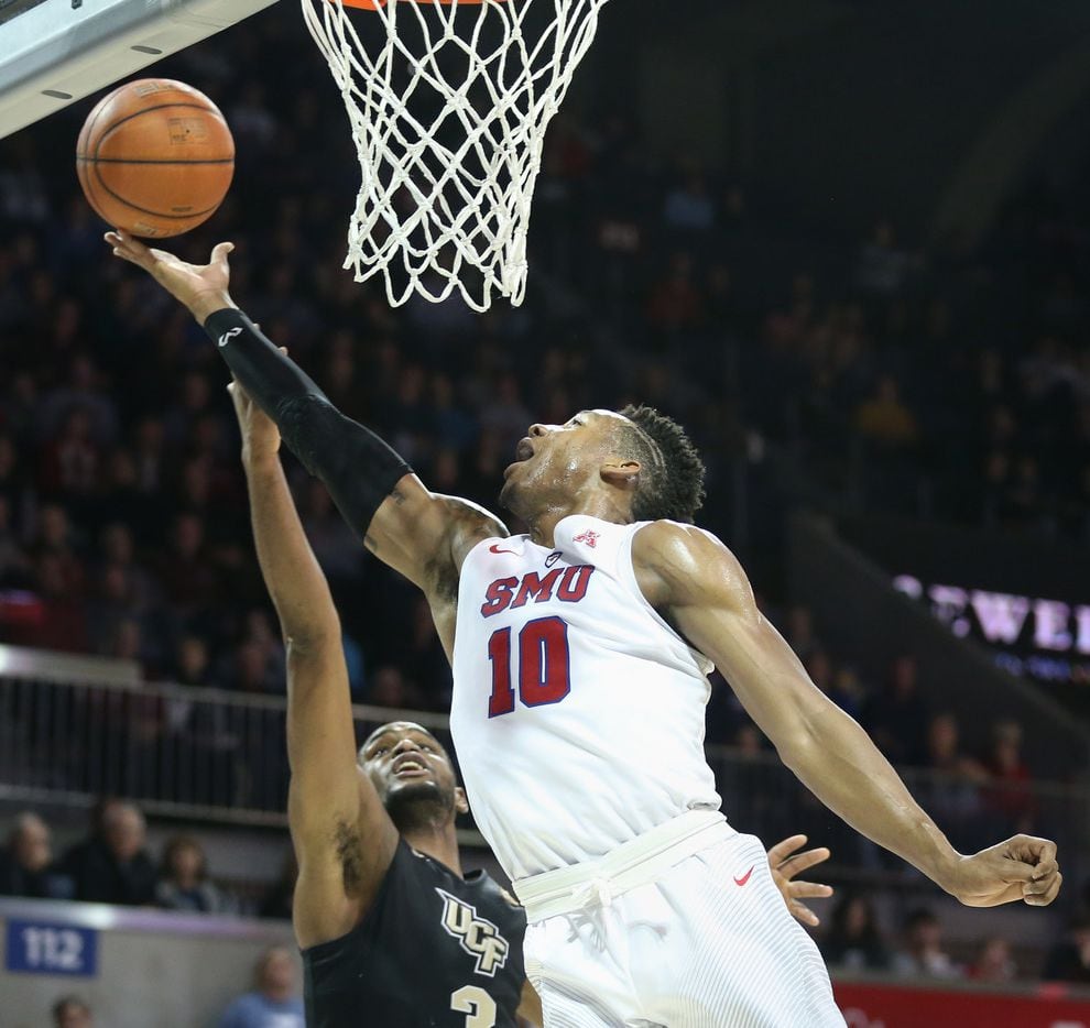 Southern Methodist Mustangs guard Jarrey Foster (10) attempts to get control of the ball...