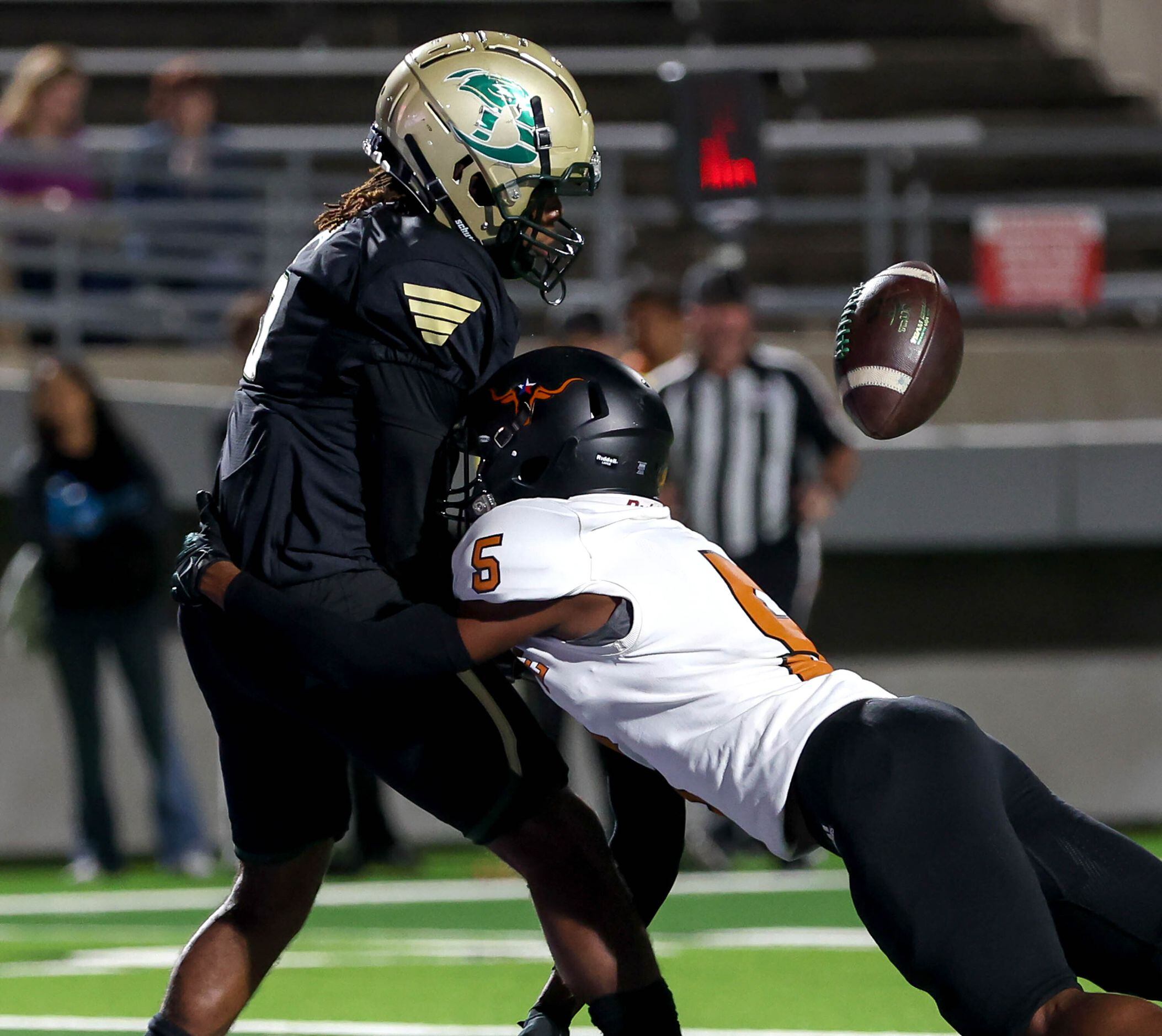 W.T. White defensive back Jermarious Jones (5) defends on a pass intended for Birdville wide...