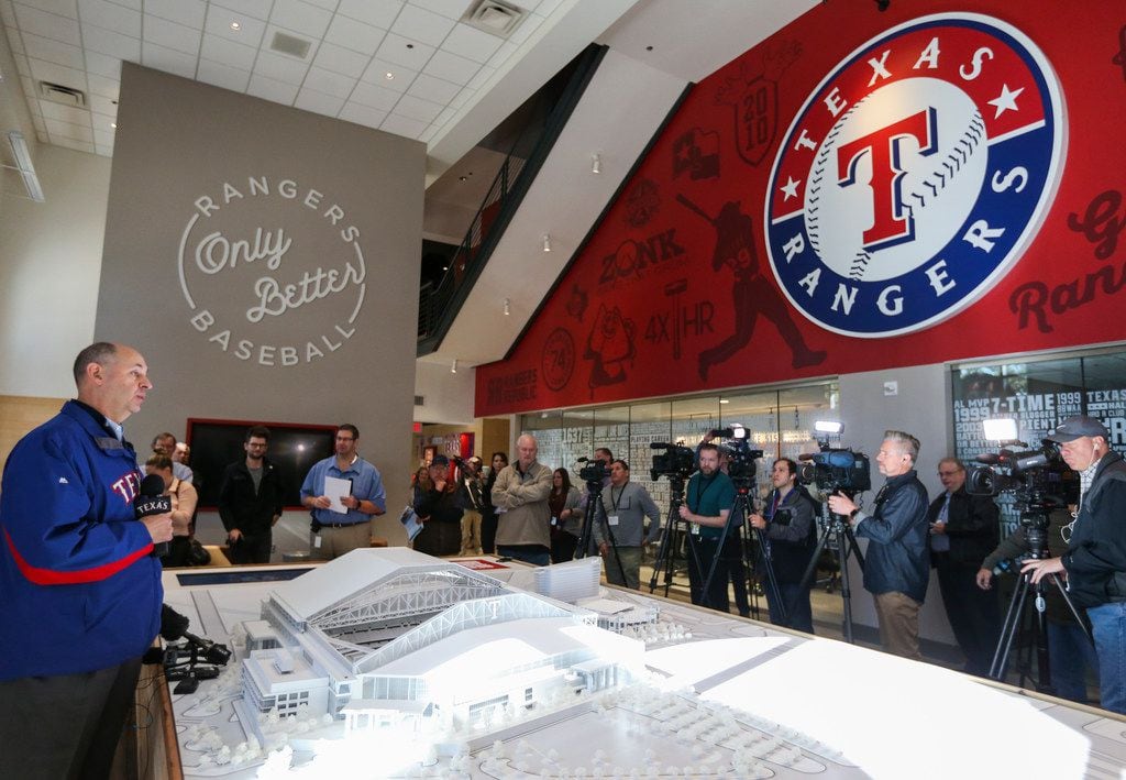 Rob Matwick, Rangers Executive Vice President of Business Operations, unveils a three...