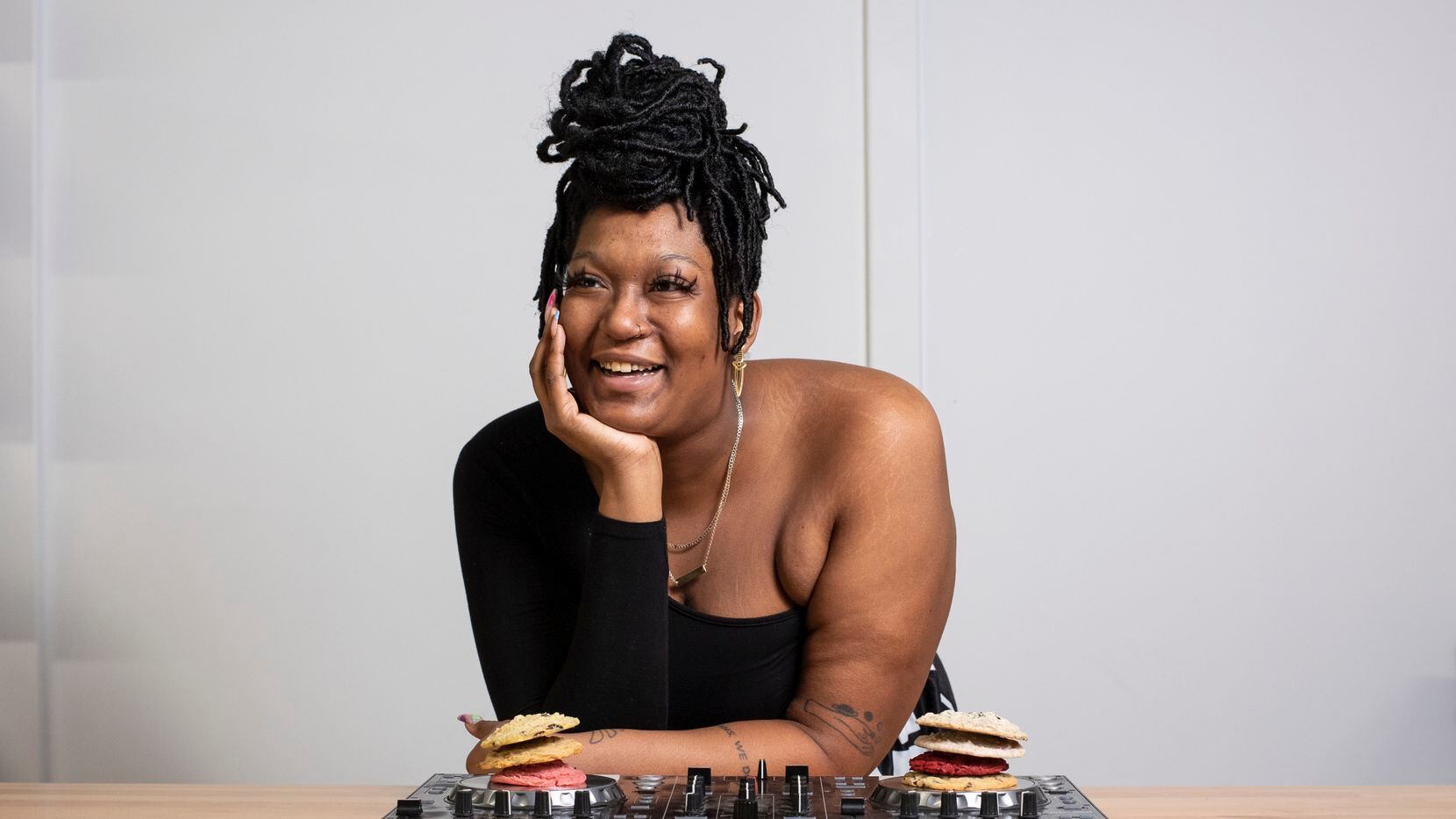 Rachel Harvey, also known as DJ Ursa Minor, with some of the cookies she bakes under as the Butter Fairy, photographed at Tyler Station in Dallas, on Monday, Oct. 19, 2020. Harvey is known for selling her cookies out of a Super Mario Bros. backpack at DJ gigs.