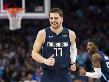 Dallas Mavericks guard Luka Doncic (77) smiles during the first quarter of an NBA game between the Indiana Pacers and the Dallas Mavericks on Sunday, March 8, 2020 at American Airlines Center in Dallas.