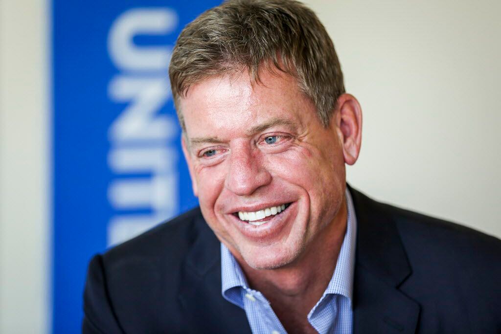 Former Cowboys quarterback and Superbowl champion Troy Aikman smiles during an interview ...