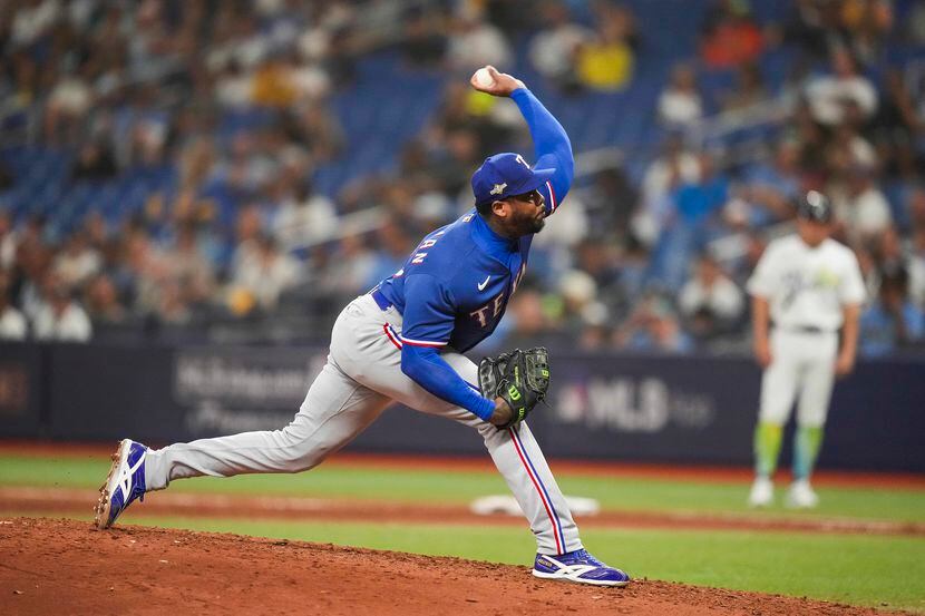 Texas Rangers relief pitcher Aroldis Chapman delivers during the ninth inning of an American...