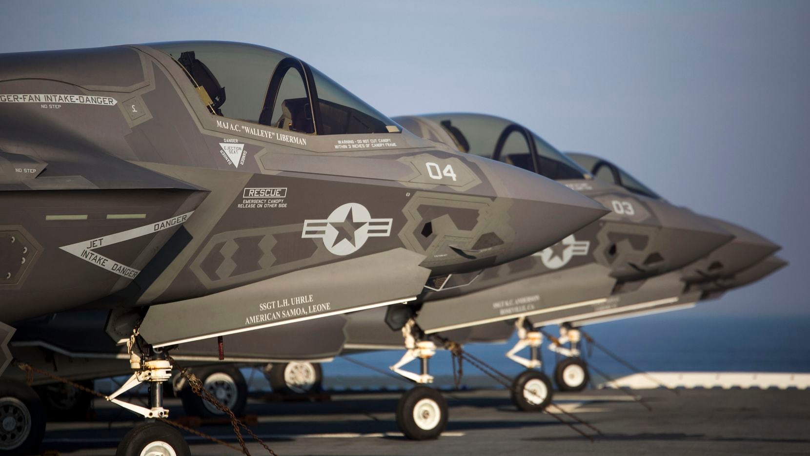  Four F-35B Lighting II Joint Strike Fighters sit secured to the deck of the USS Wasp In...