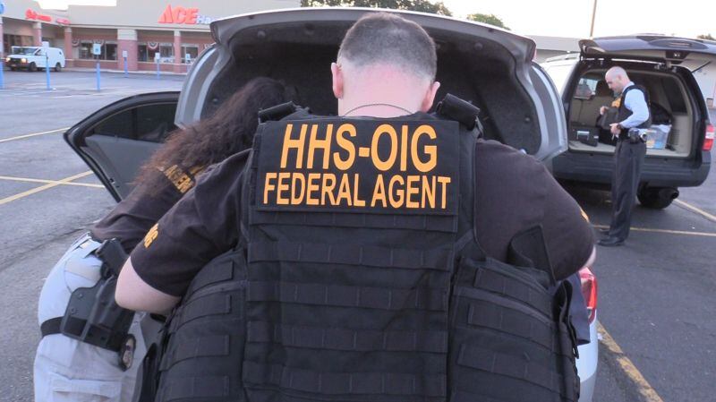 Federal agents suit up to make arrests for health care fraud as part of a nationwide sweep