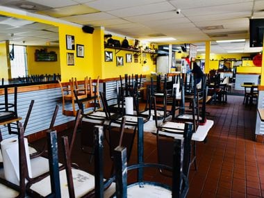 The dining area inside Tacos la Banqueta taqueria in East Dallas is closed to comply with Dallas Mayor Eric Johnson's order to close all bars and limit restaurants to take-out, delivery and drive-thru only.
