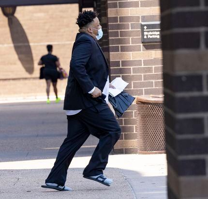 Jonathan Pitts leaves after visiting the pre-trial services office on Monday, Aug. 16, 2021,...