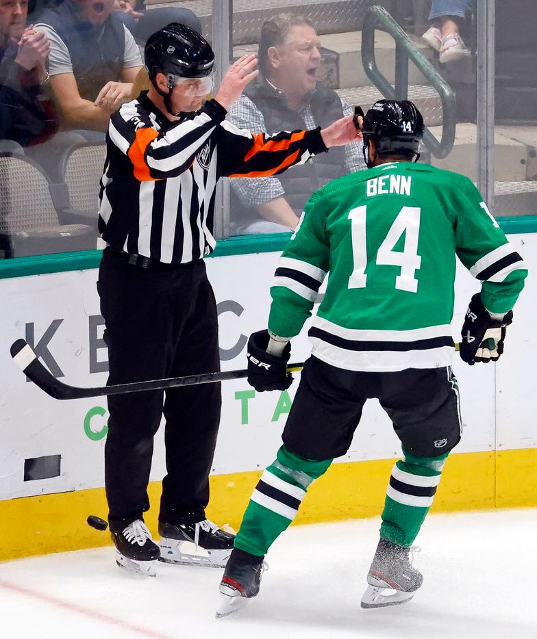 Dallas Stars left wing Jamie Benn (14) was called for a penalty by referee Chris Schlenker...