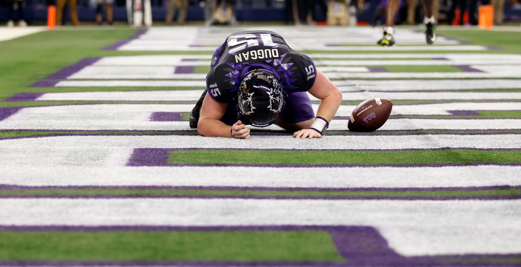 TCU Horned Frogs quarterback Max Duggan (15) is slow to get up after his fourth quarter...