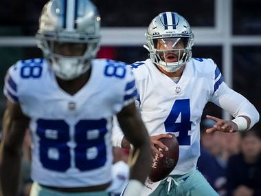 Dallas Cowboys quarterback Dak Prescott (4) looks for wide receiver CeeDee Lamb (88) during an NFL football game New England Patriots on Sunday, Oct. 17, 2021, in Foxborough, Mass.