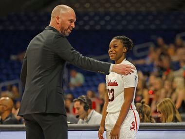 Frisco Liberty head coach Ross Reedy has the attention of Journee Harris (23) as Frisco...