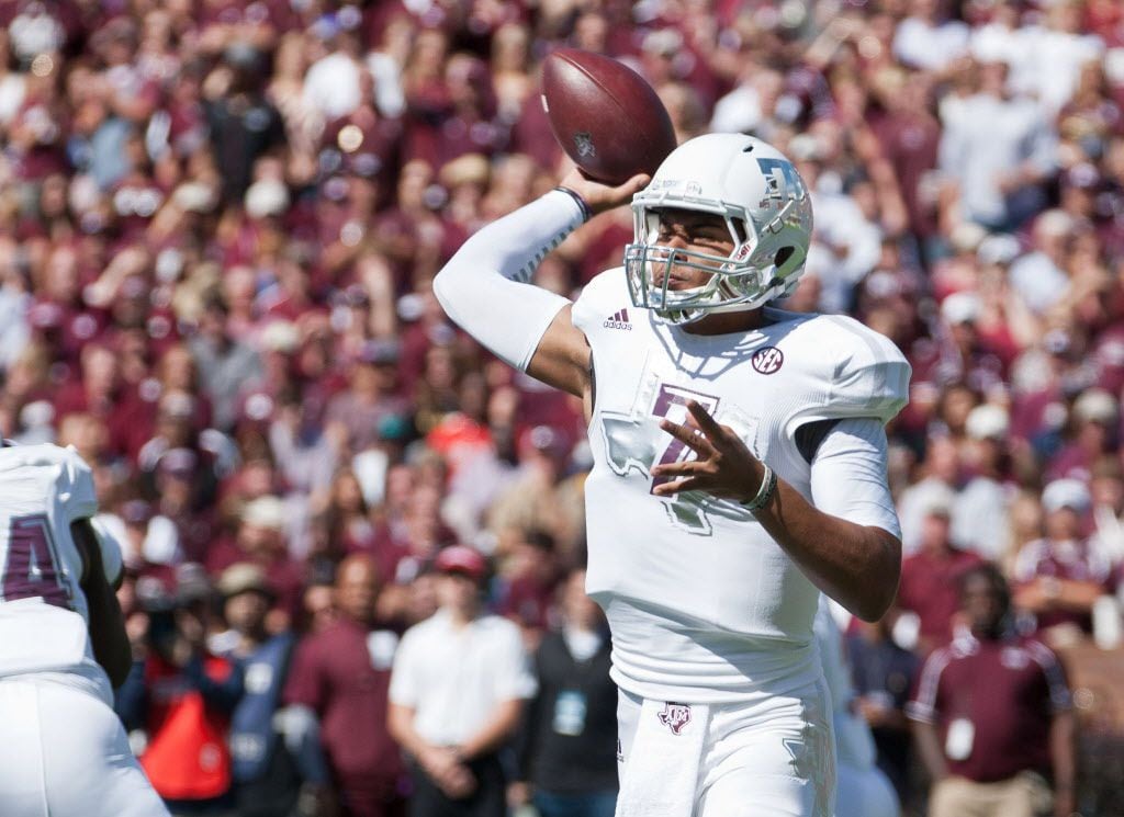 Oct 4, 2014; Starkville, MS, USA; Texas A&M Aggies quarterback Kenny Hill (7) throws the...