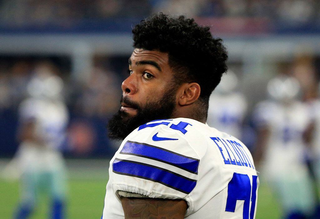 FILE - In this Oct. 12, 2017, file photo, Dallas Cowboys' Ezekiel Elliott stands on the...