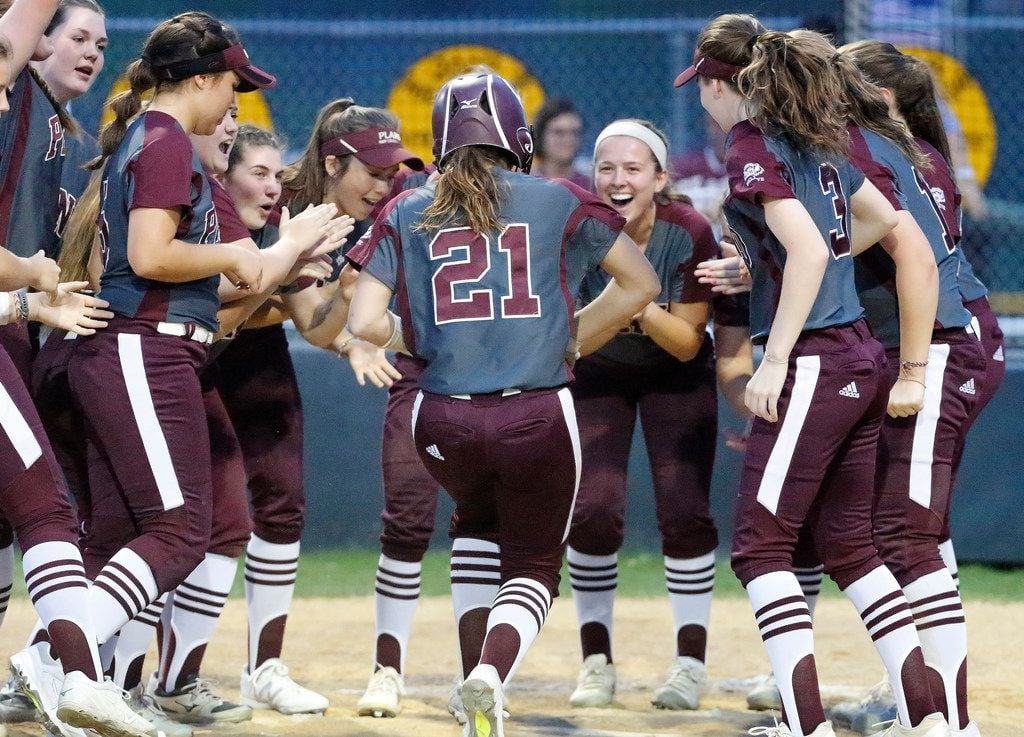 Plano's Lindsay Edwards (21) is congratulated at home plate after hitting a home run in a 16-12 win over Plano East on Monday, March 26, 2018.  (Stewart F. House/Special Contributor)