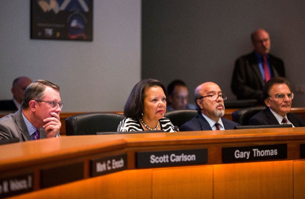 The board of the Dallas Area Rapid Transit votes on a rail corridor on Tuesday, October 25,...