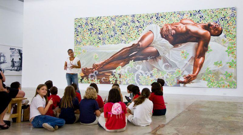 Works by Kehinde Wiley are on display as part of the "30 Americans" exhibit at the Arlington...