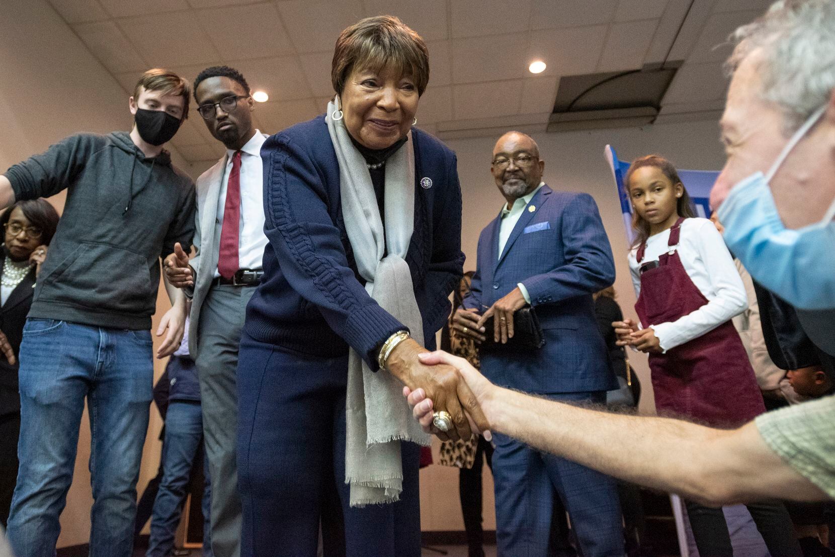 U.S. Rep. Eddie Bernice Johnson is congratulated by friends and colleagues after she announced that she will retire from Congress during “The Justice Tour