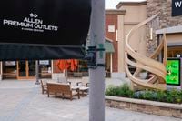 A memorial to victims of the Allen Premium Outlets mass shooting was unveiled Monday on the...