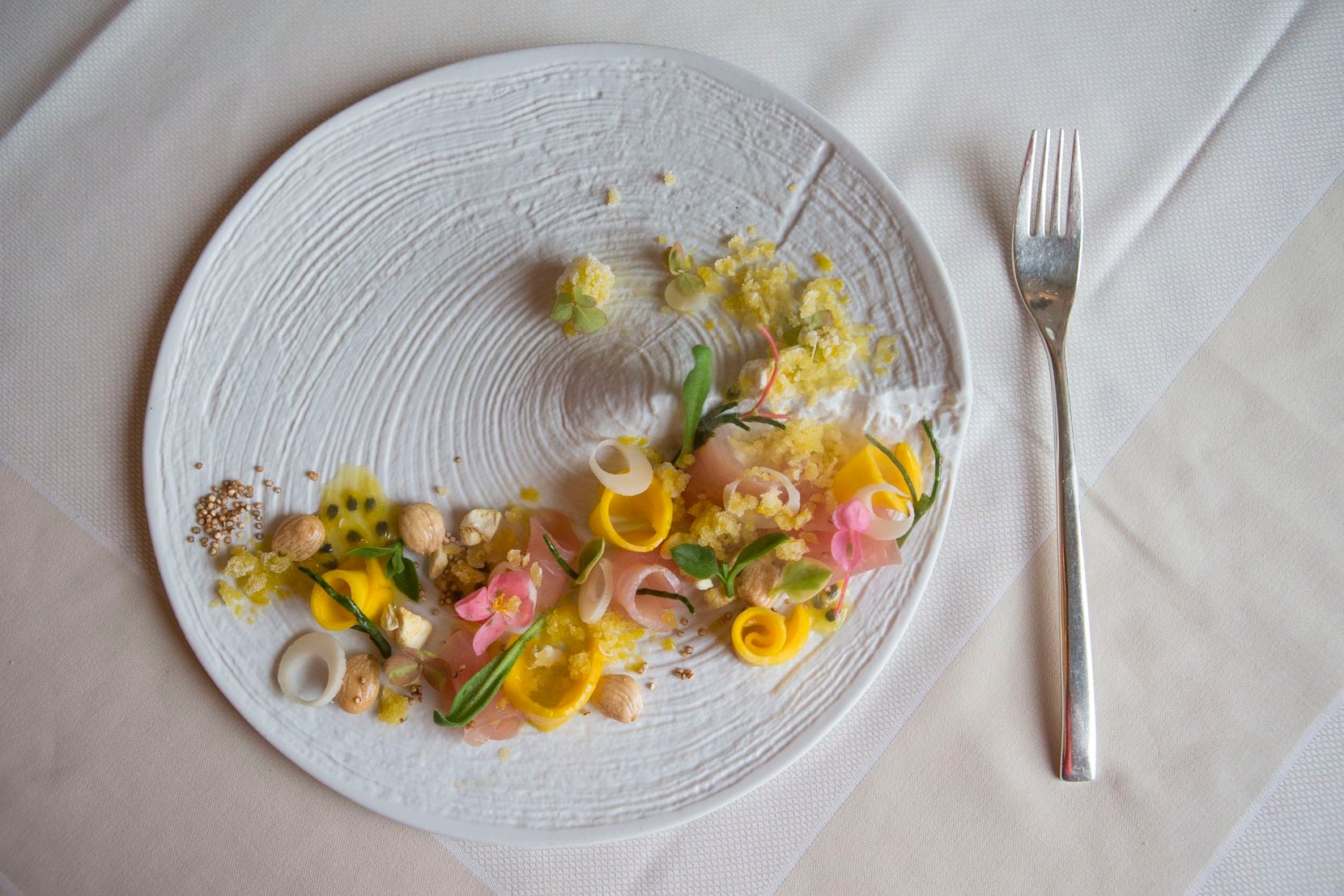 In 2017, Stephan Pyles Flora Street Cafe served beautiful, colorful dishes like this crudo...
