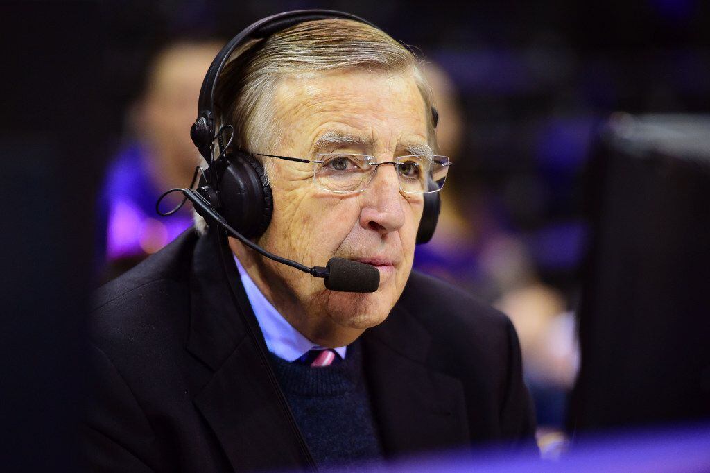 In this Jan. 30, 2016 photo provided by ESPN, Brent Musburger works a college basketball...