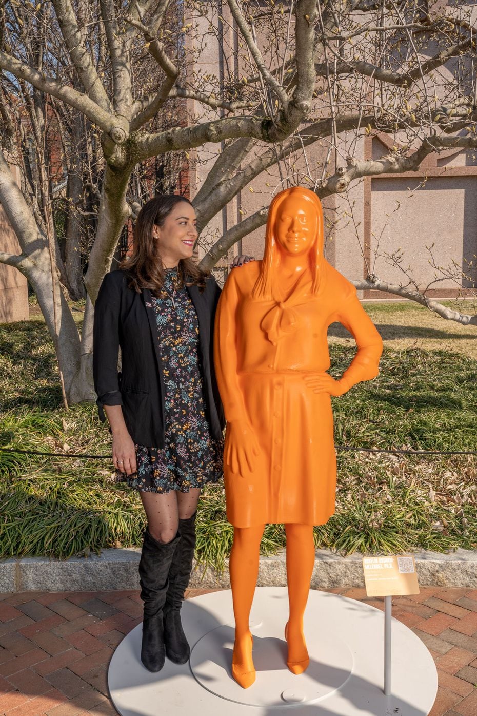 Polymer chemist Roselin Rosario-Melendez stands next to her statue that was created for...