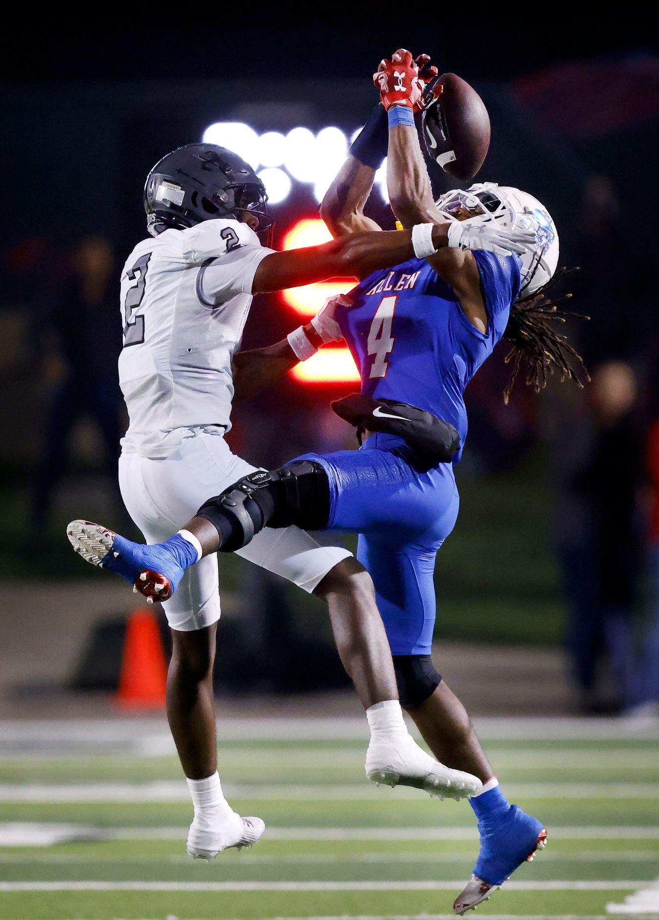 Allen wide receiver Messiah Washington (4) goes up and lets a second quarter pass slip past...