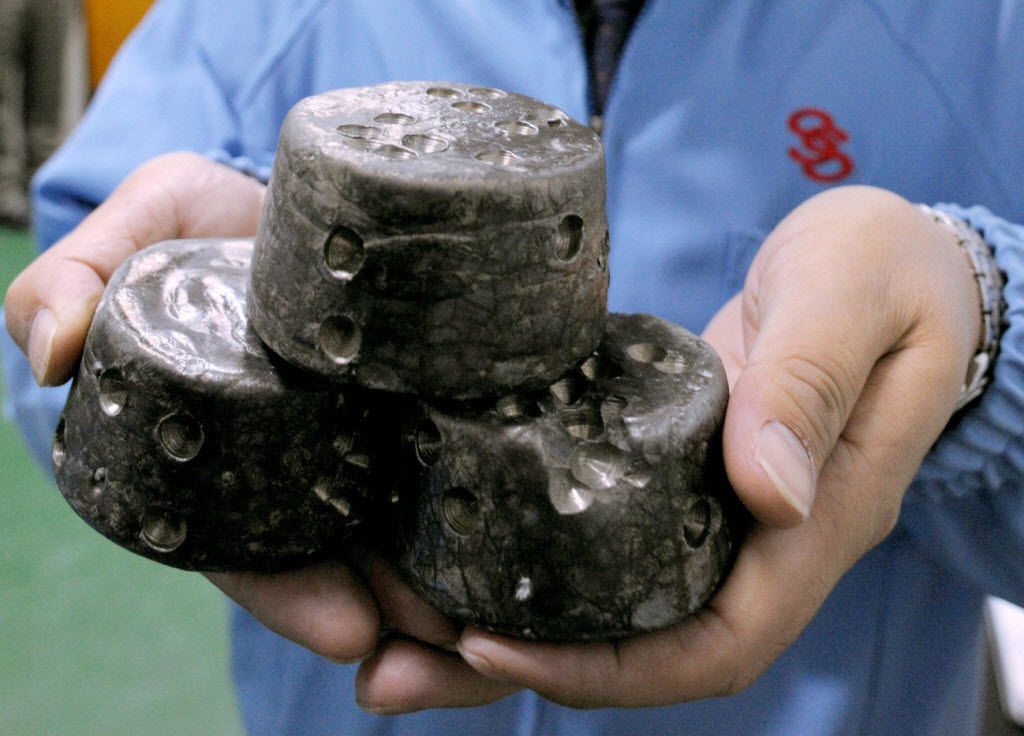 In this undated photo, chunks of chemically processed rare earths are shown in Beijing. 