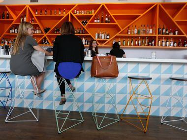 Taylor Gainan, left, and  Elise Lynott, conduct business at the Halcyon Coffee Bar and...