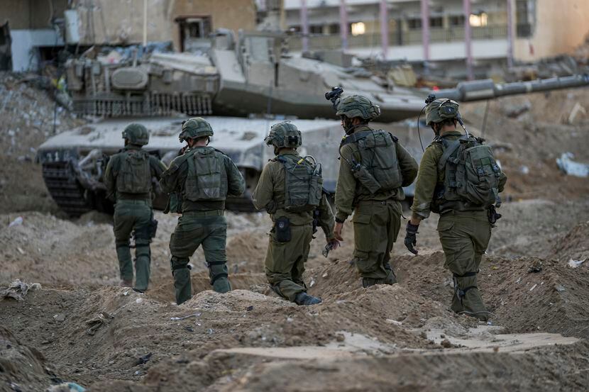 Israeli soldiers are seen during a ground operation in the Gaza Strip, Wednesday, Nov. 8,...