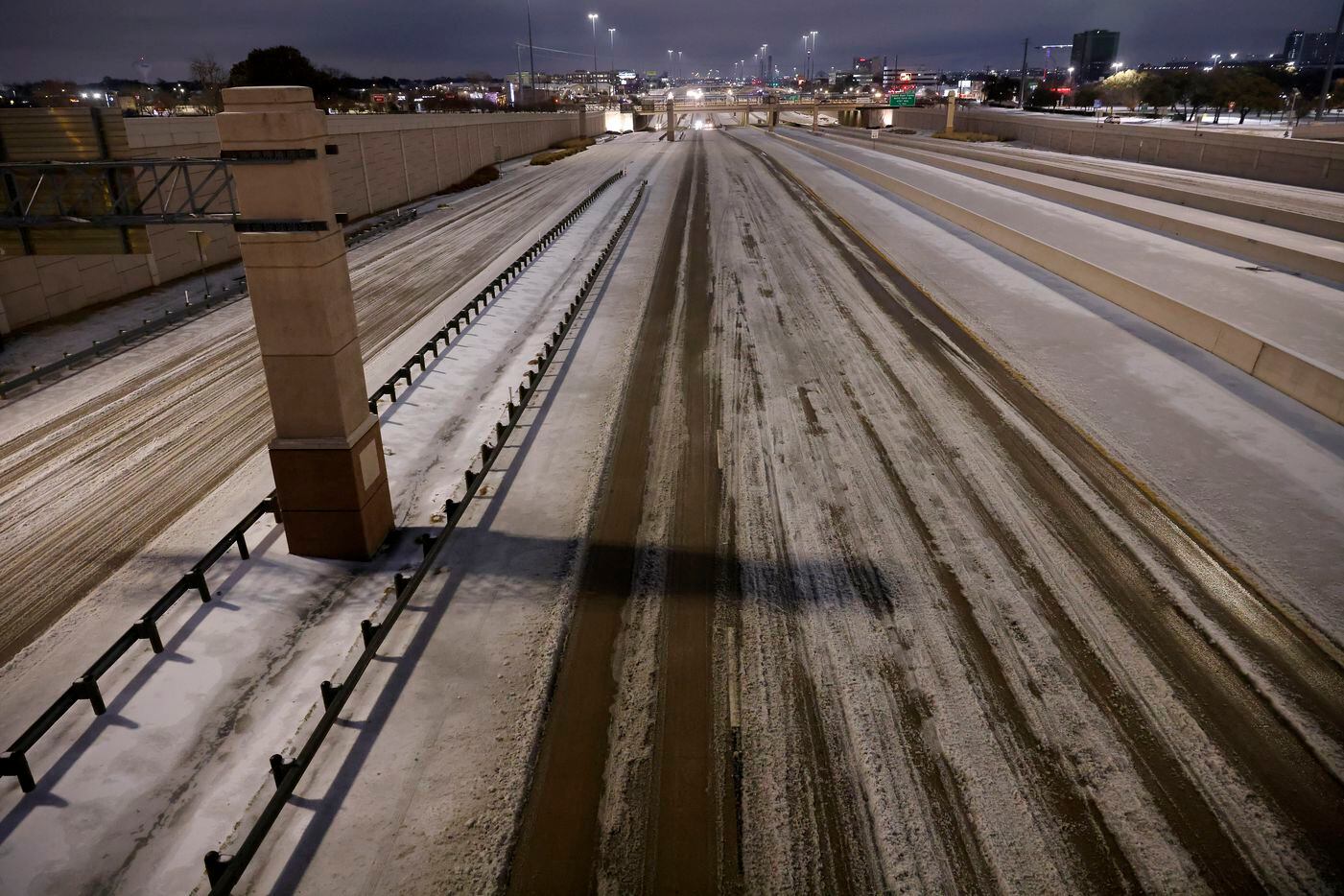 Traffic on westbound Interstate 30 is light during the rush-hour after a band of sleet...