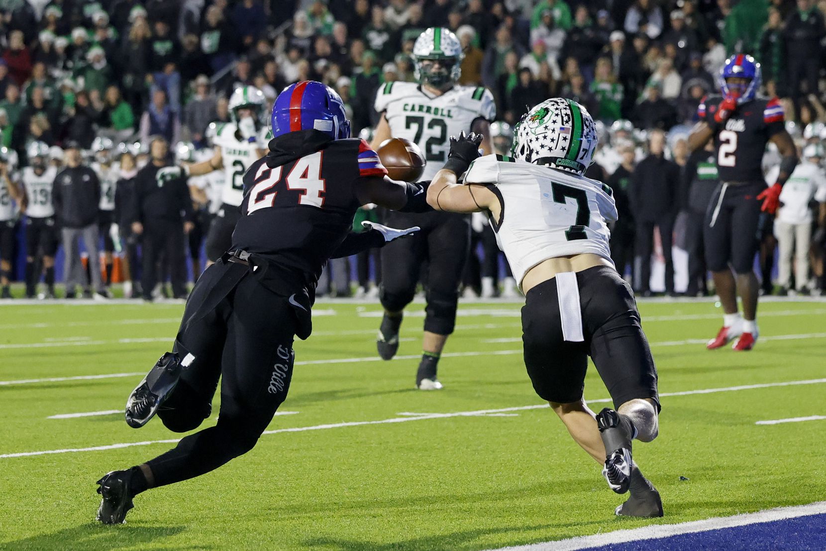 Duncanville defensive back Cole Carter (24) intercepts a pass from Southlake Carroll...