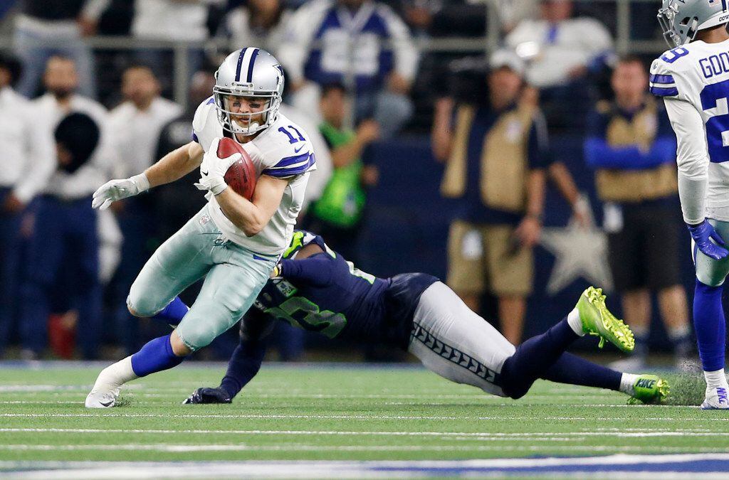 Dallas Cowboys wide receiver Cole Beasley (11) breaks away from Seattle Seahawks defensive...