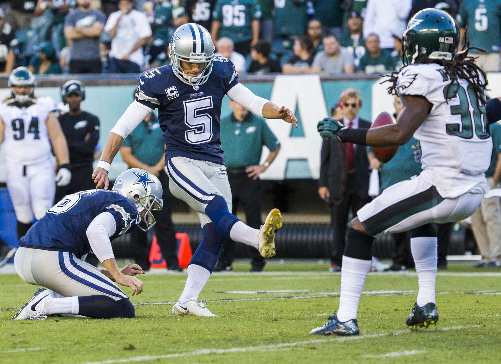 Dallas Cowboys kicker Dan Bailey (5) kicks a field goal during the first half of their game...