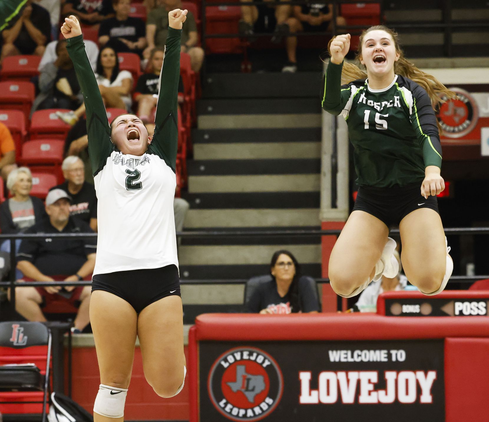 Prosper’s Brooklyn Bowman, left, and Resse Renfrow reacts as they celebrate a point against...