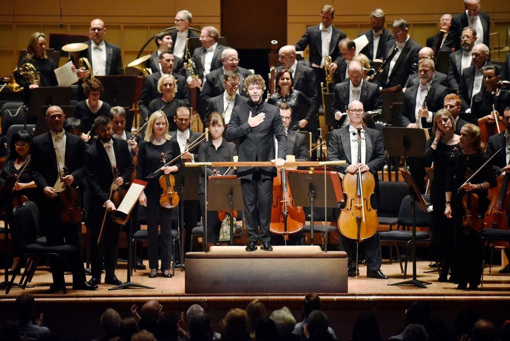 Guest conductor Pablo Heras-Casado is applauded after conducting the Dallas Symphony...