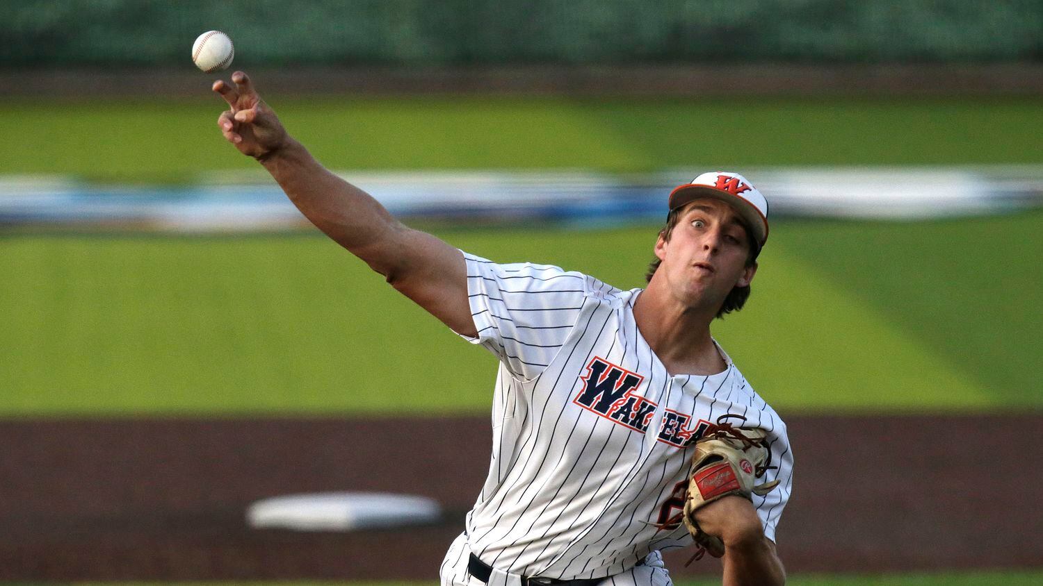 Frisco Wakeland's Carson Priebe delivers a pitch in the first inning during a 10-5 win over...