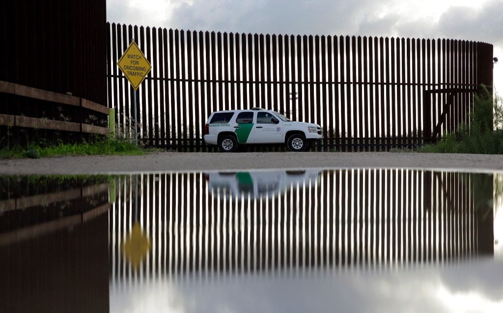 In this Sept. 15, 2015 photo, a U.S. Customs and Border Patrol agent patrols along the...