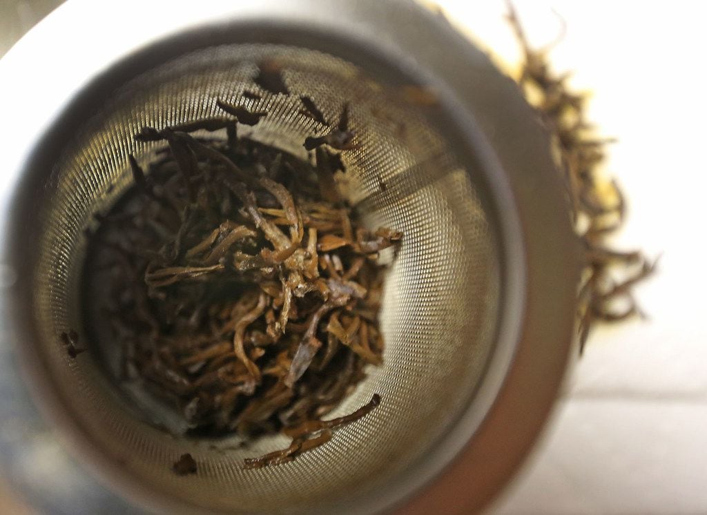Himalayan Golden Tips tea leaves from Nepal, pictured after steeping at the Rakkasan Tea...