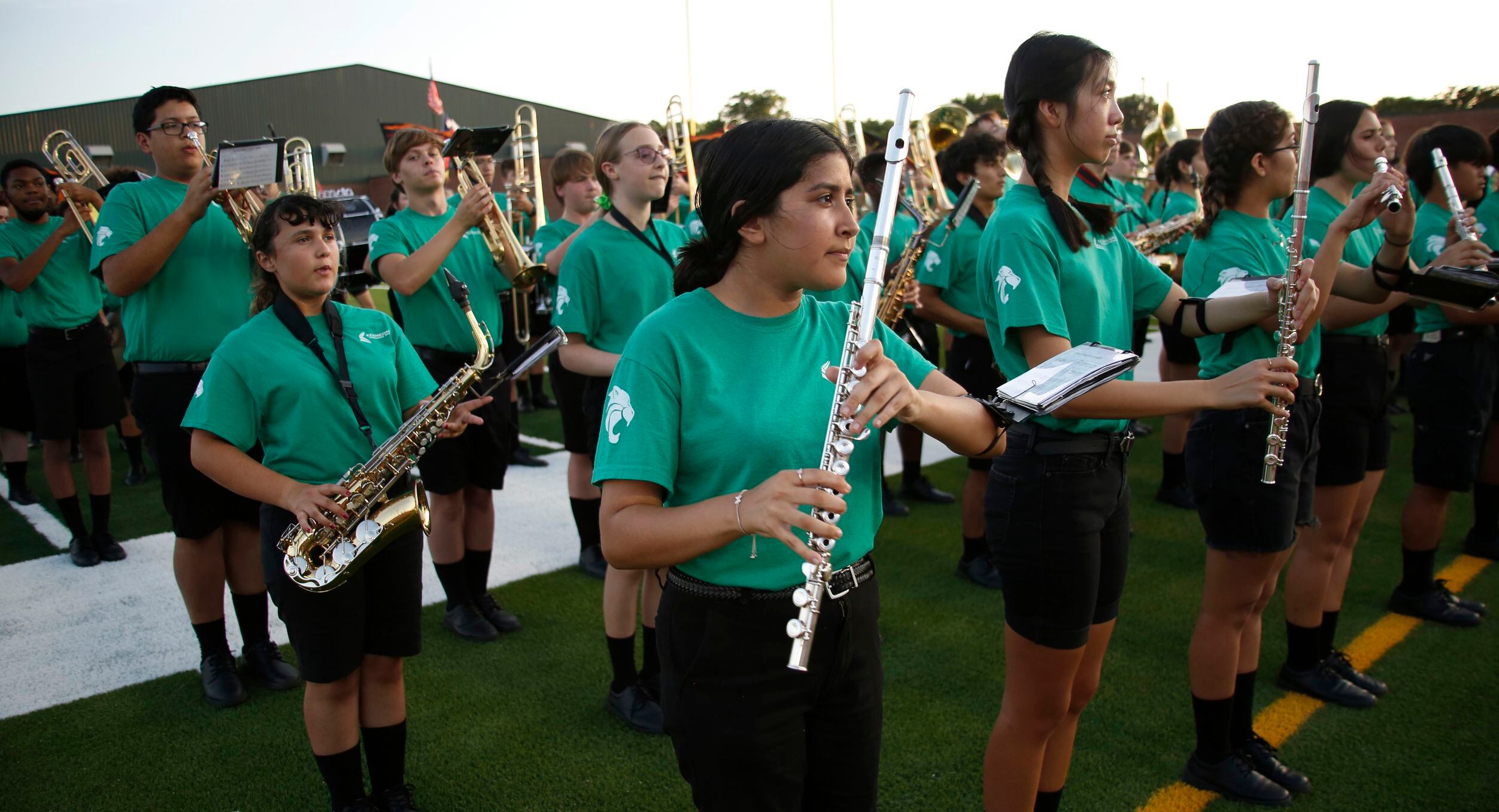 Members of the Kennedale band finish playing the school alma mater prior to the opening...