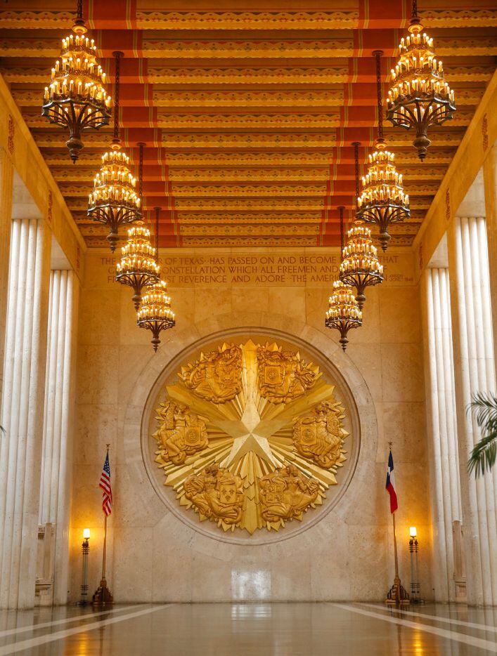 Fair Park's Hall of State gold-leafed medallion represents  the six flags of Texas,...