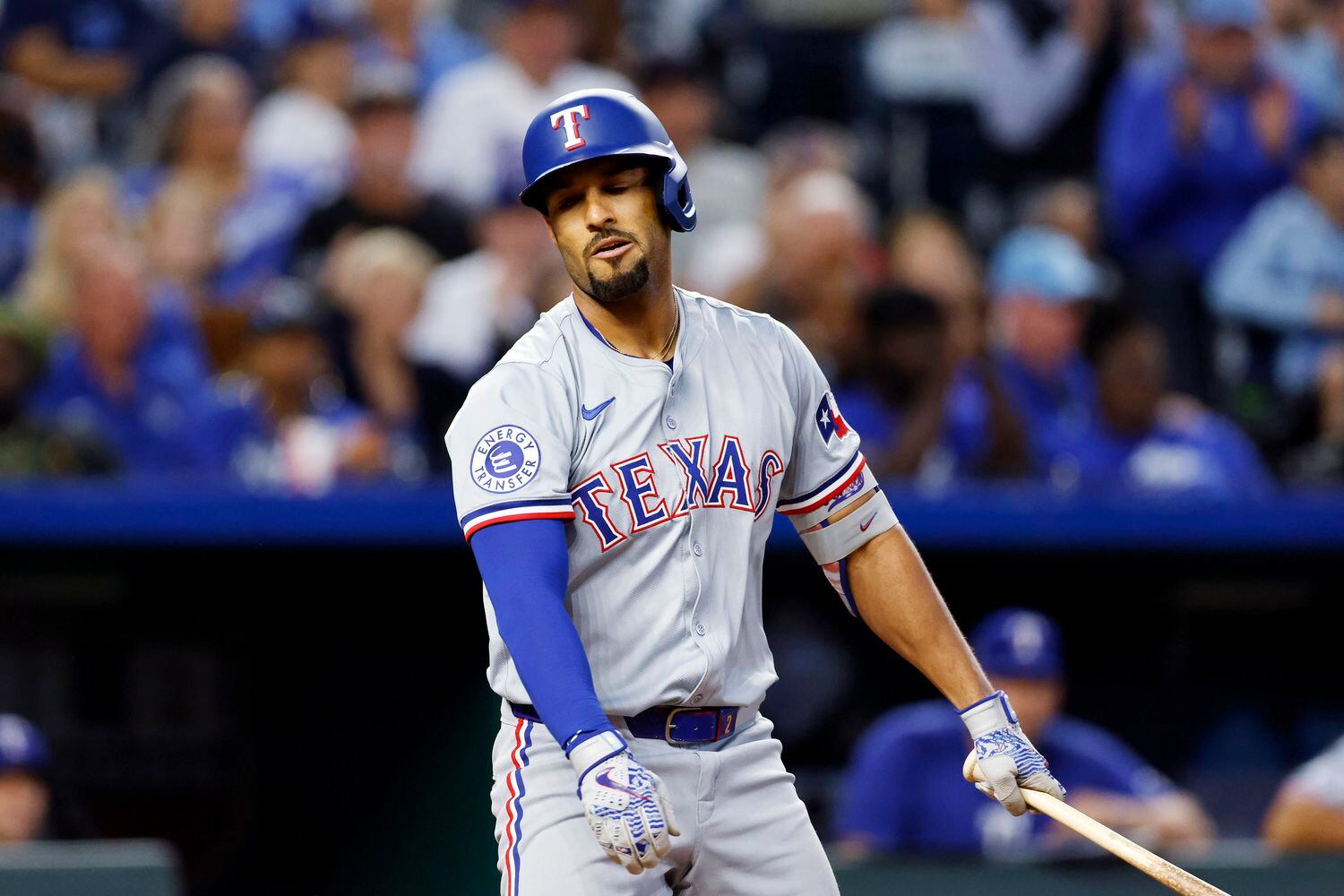 Texas Rangers' Marcus Semien reacts after striking out with the bases loaded during the...