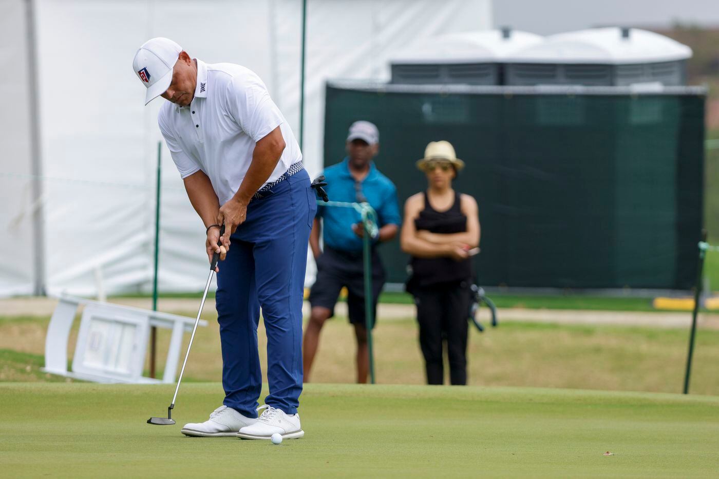 MLB Hall of Fame catcher Ivan "Pudge" Rodriguez putts the ball on the ninth green during the...