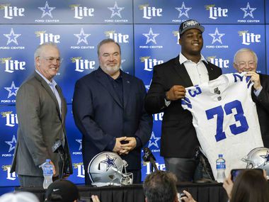 From left, Dallas Cowboys Chief Operating Officer Stephen Jones, Head Coach Mike McCarthy,...